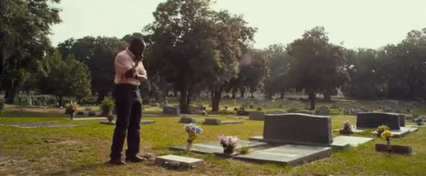 Nathan Hayes stands at his father's grave and forgives him for his absence in "Courageous."